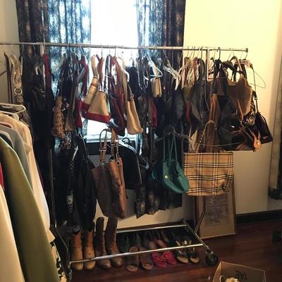 Rack filled with designer handbags (10 Coach,
LV, plus many others)