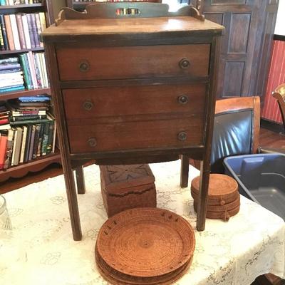 Small sewing cabinet and African baskets