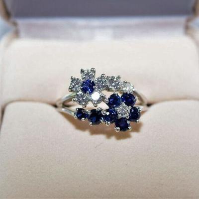 Lot 002-T: Woman’s Platinum & Diamond Flower Ring