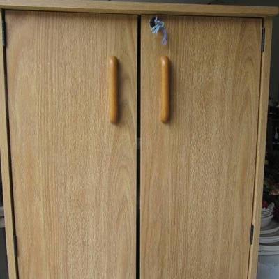 Cabinet w lock and key shelves and doors for CDs a ...