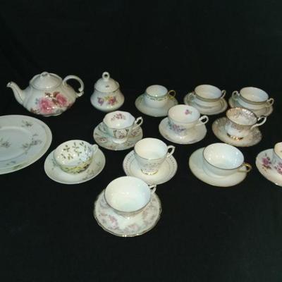 Variety of Teacup, Saucers, Teapots