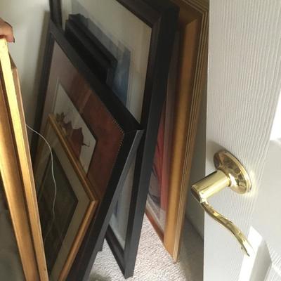 Many framed pictures