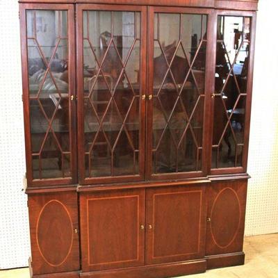 2 Piece Burl Mahogany 4 Door China Cabinet by â€œBaker Furniture Charleston Collectionâ€
Located Inside â€“ Auction Estimate $600-$1200
