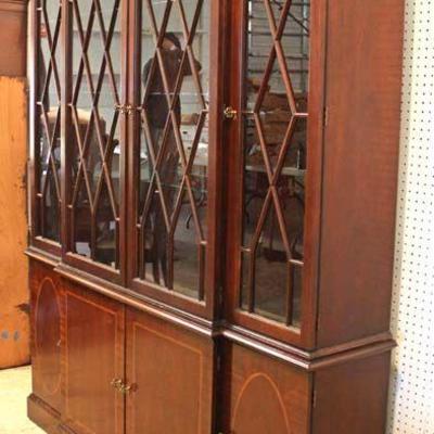 2 Piece Burl Mahogany 4 Door China Cabinet by â€œBaker Furniture Charleston Collectionâ€
Located Inside â€“ Auction Estimate $600-$1200
