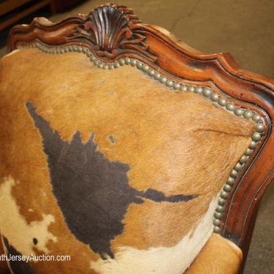 2 Piece Leather and Cowhide Western Decorative Club Chair and Ottoman
Located Inside â€“ Auction Estimate $300-$600
