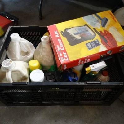Lot of car care supplies in a collapsible crate.