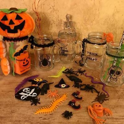 Assortment of Halloween Jars and container with tr ...