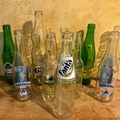 Set of glass soda beer bottles with labels for dÃ© ...