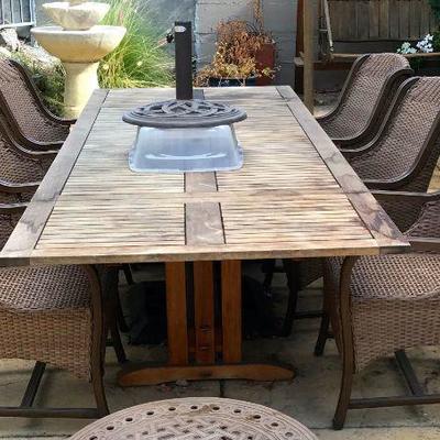 Les Jardins Teak Patio Dining Extension Table
6 AGIO Durable Wicker Chairs With Sunbrella Fabric, And Matching Club Chair With Ottoman...