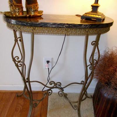 Demi lune marble and metal table $220
28 x 12 x 32