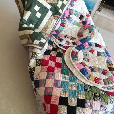 Hand stitched quilts. $100-200