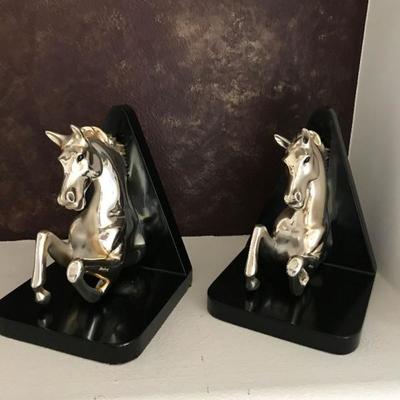 Silver plated horse book ends. $65 each.