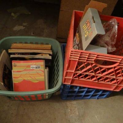Basket w books & 2 crates.