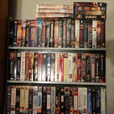 Lot of vhs & homemade stand.