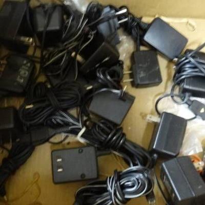 Lot of chargers and power cords.