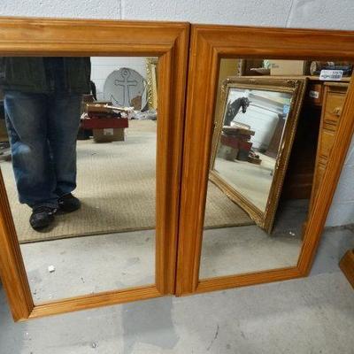 Pair of matching wood framed wall mirrors