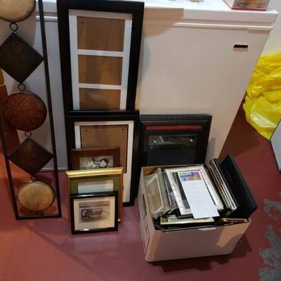 Lot of picture frames and wall art