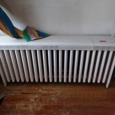 Old Fashioned Cast Iron Radiator with Decorative G ...
