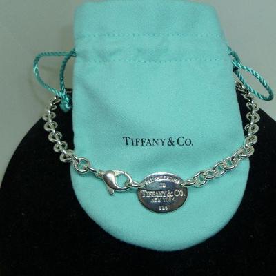 Tiffany Please Return to Tiffany Sterling silver oval tag necklace.