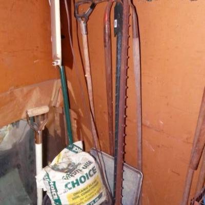 Lot with Organic blend soil, trash can, yard tools ...