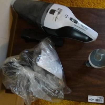 Holife hand held vacuum with accesories.