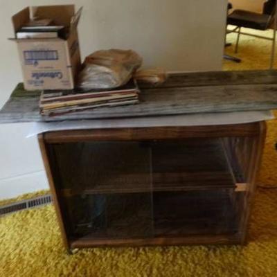 T.V. cart with records.
