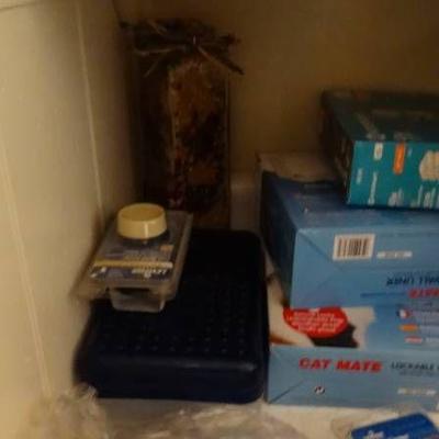 Box with some tools, light bulbs, wall liner, rota ...