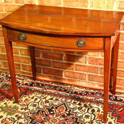 antique bow front, walnut table with drawer, single board construction