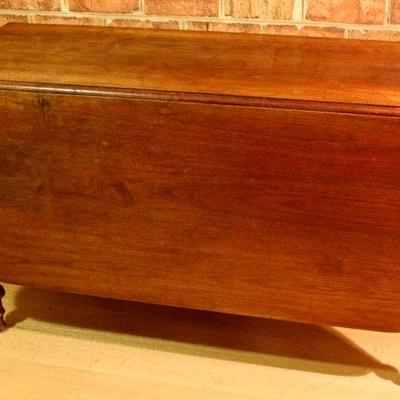 antique walnut drop leaf table, single board construction - 