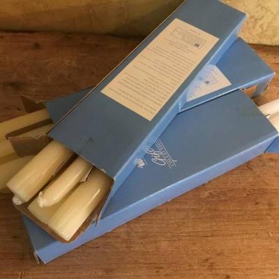 3 boxes of new tapered candles (while and ivory)
