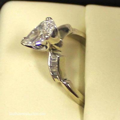  14 Karat White Gold Diamond Ladies Ring

Located Inside â€“ Auction Estimate $1000-$2000 