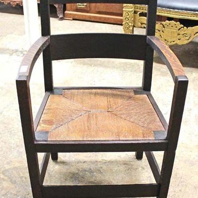  ANTIQUE Mission Oak Rush Bottom Arm Chair

Located Inside â€“ Auction Estimate $50-$100 