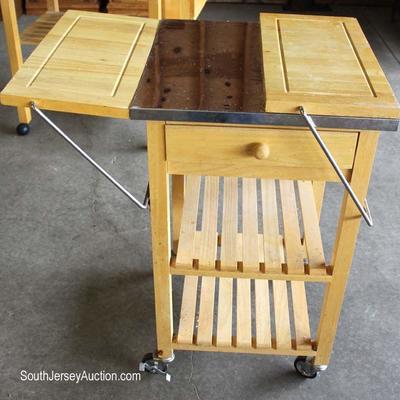  Selection of Butcher Block Kitchen Work Tables

Located Dock â€“ Auction Estimate $50-$200 