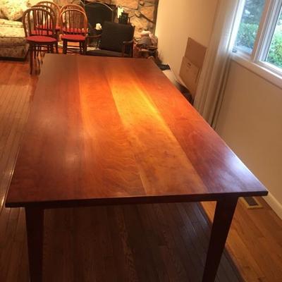 Custom made cherry dining table by woodworker Hal McKusic of Sag Harbor.