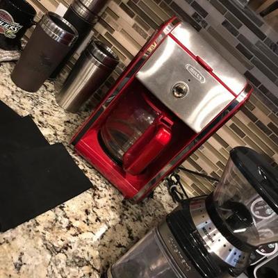 Bella red coffee machine @ $15. Cuisinart coffee  grinder machine @ $18.