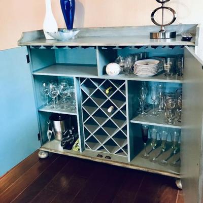 Pulaski Xavier Wine Cabinet. Light blue. 51" x 17" x 43". www.amazon.com @ $624. Estate sale price: $298
