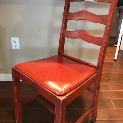 Red chair with cushion. $30