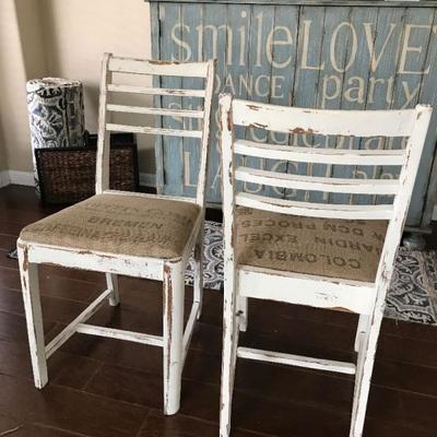 Distressed  chairs with burlap seat. $35 each.