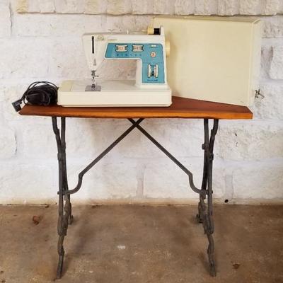 Singer sewing machine with cover. $20