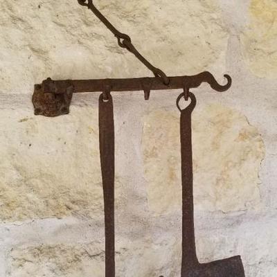 Cast iron antique cooking utensils with handing rack. Set for $75