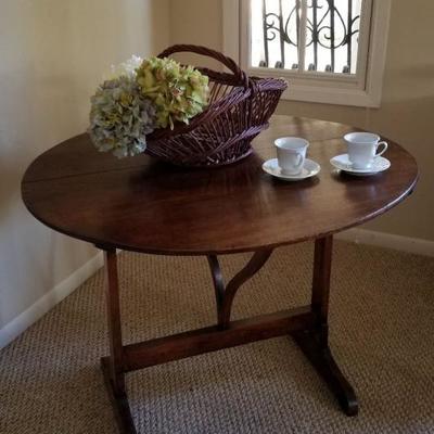 Drop leaf small round table. $110