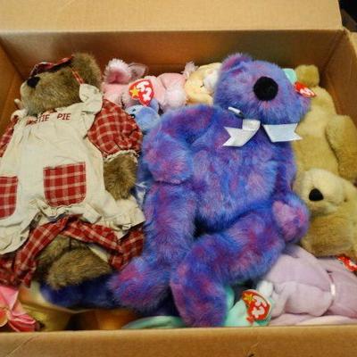 Lot of beanie babies and stuffed animals.