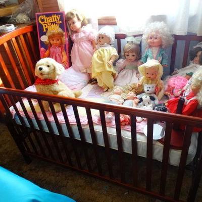 Wooden baby crib, drop side.