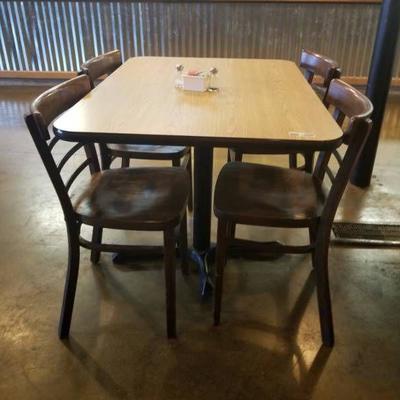 Wood Look Table and Four Wood Chairs Set.