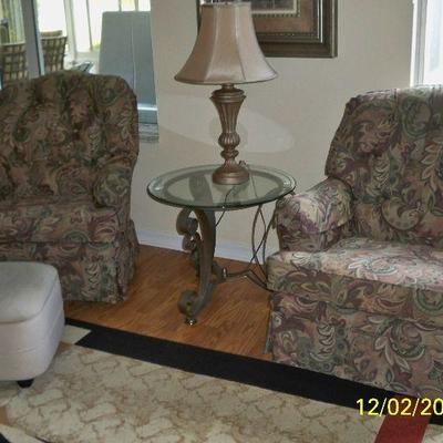 2 - Lazy Boy Swivel Rocker Chair(s); Metal with Glass Top End Table (1 of 2); Table Lamp (1 of 2).