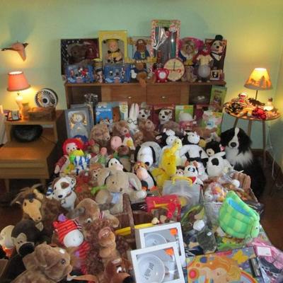 Dozens of unused toys and stuffed animals