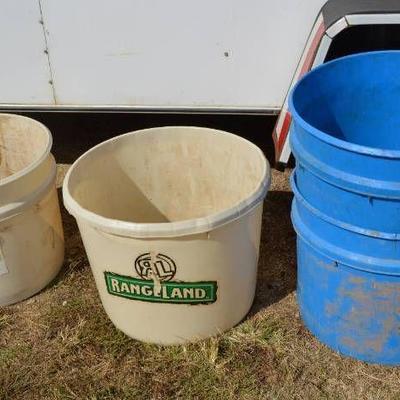 Lot of 4 feed tubs - the 2 blue ones have holes in ...