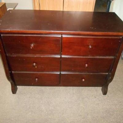 Six Drawer Mahogany Color Chest of Drawers