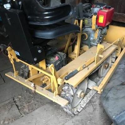 Mini Bulldozer, doesn't look to have been used at all, with diesel engine.  See following three photos
