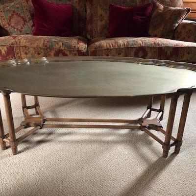 Brass scalloped top on wooden base coffee table